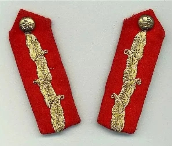Crimson patches with golden braids
