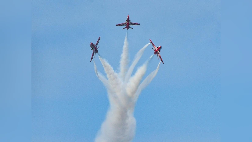 IAFs Surya Kiran team mesmerizes Hisar crowds with breathtaking aerobatics showcasing Indias ...webp