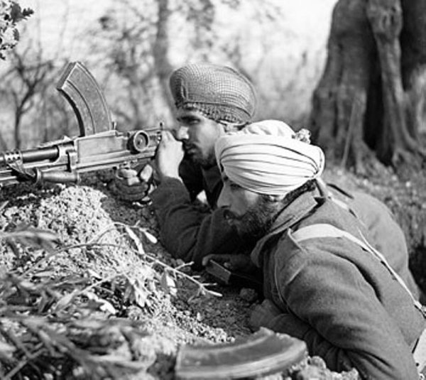 Two Sikh soldiers from the Indian Army using a Bren light machine gun in the Italian campaign