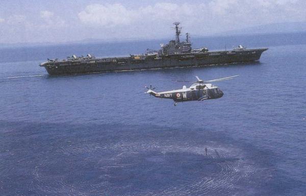INS Vikrant with a sea king helicopter