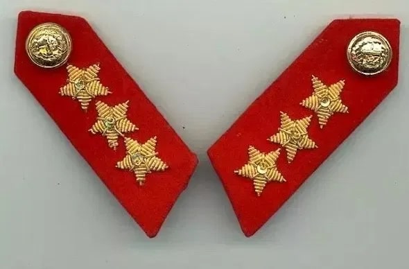 Crimson patches with Three golden stars