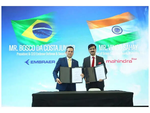 Mahindra sign landmark agreement with Embraer to build C390 transport aircraft locally under ...webp